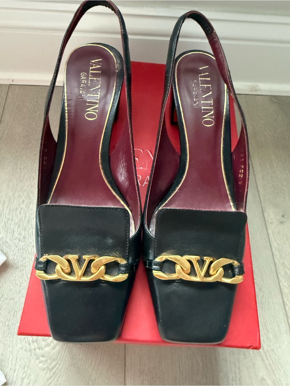 Valentino Black Slingback Heels with Gold Chain Logo Detail